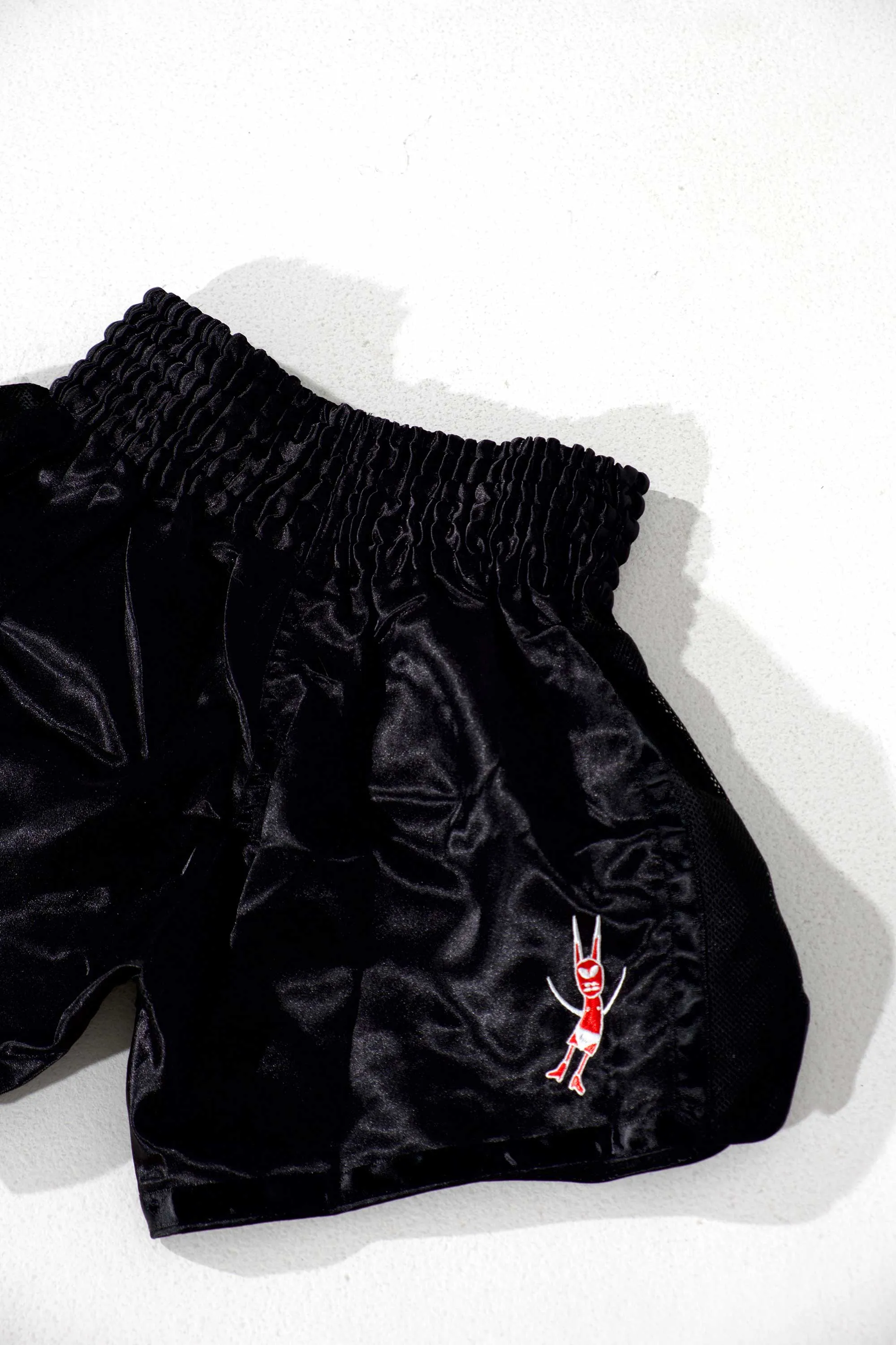 Space Muay Thai Shorts (Black/Red)